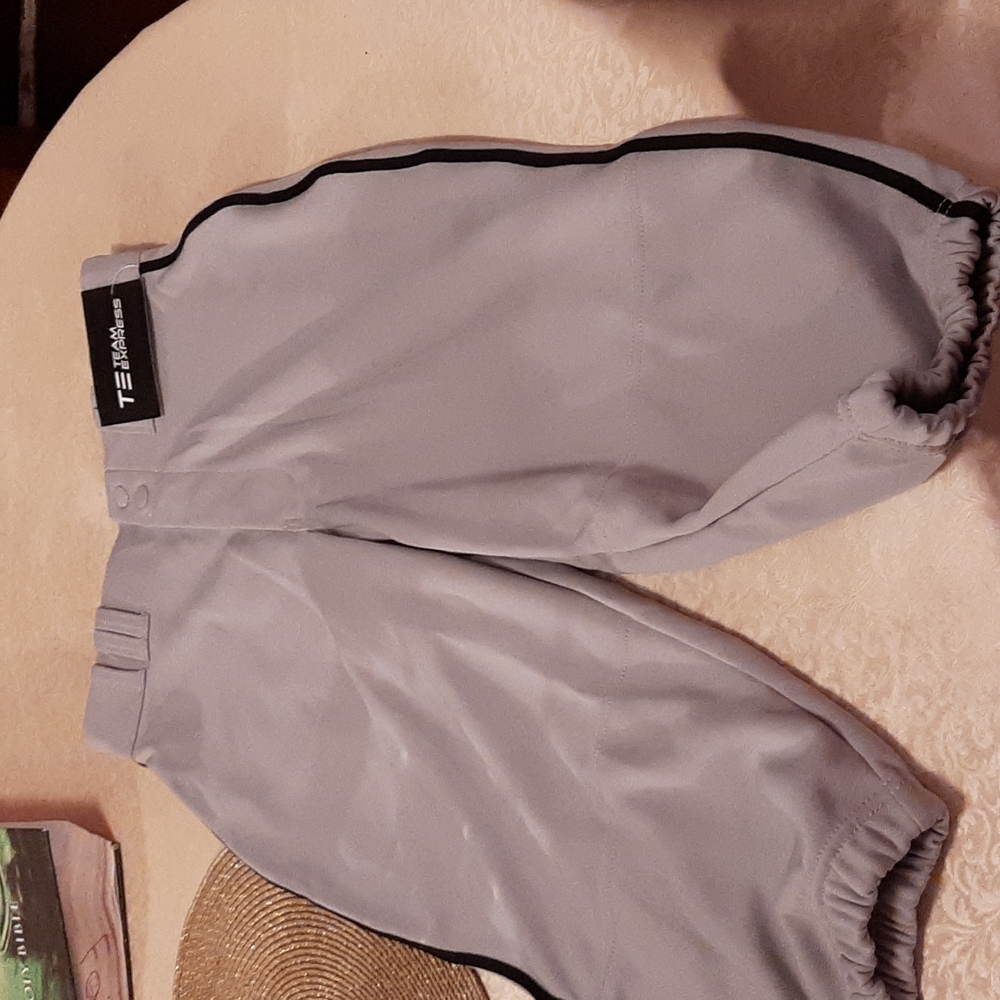 Brand new knee length baseball pants.